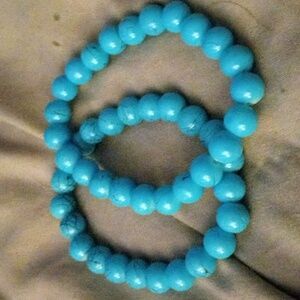 SET OF TWO TURQUOISE STRETCH BRACELETS WITH SIX TO EIGHT INCH